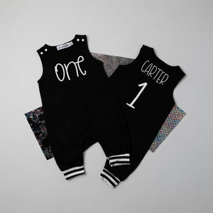 Minimalistic One 1st Birthday Romper with Striped Cuff